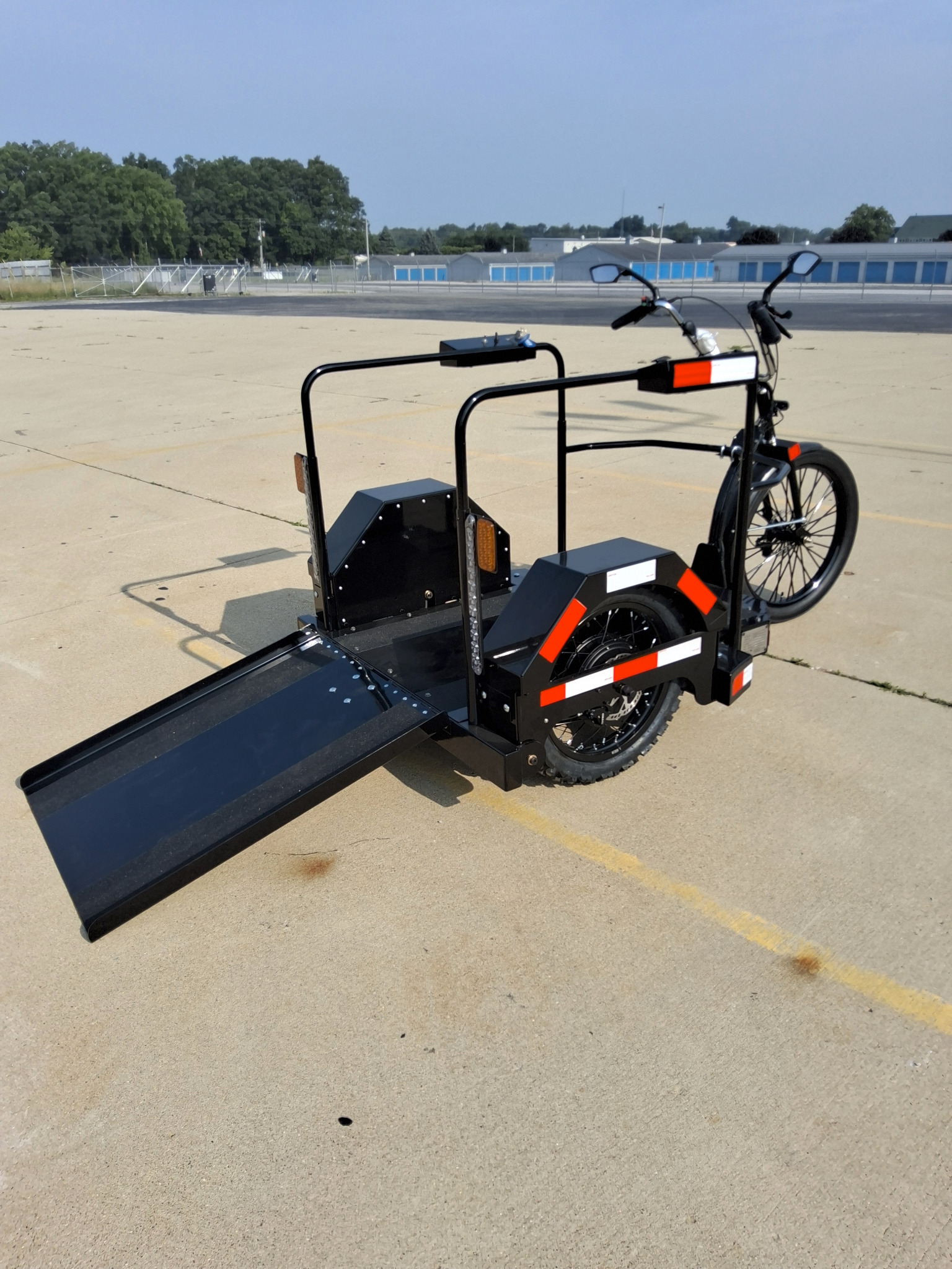 Drive-On wheelchair platform and safety rails